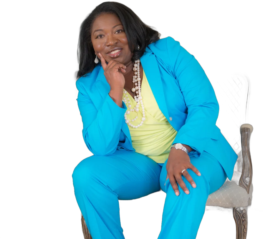 Kelly Jennings in a turquoise suit, smiling